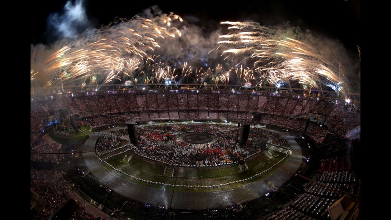 Fireworks explode from the stadium roof.