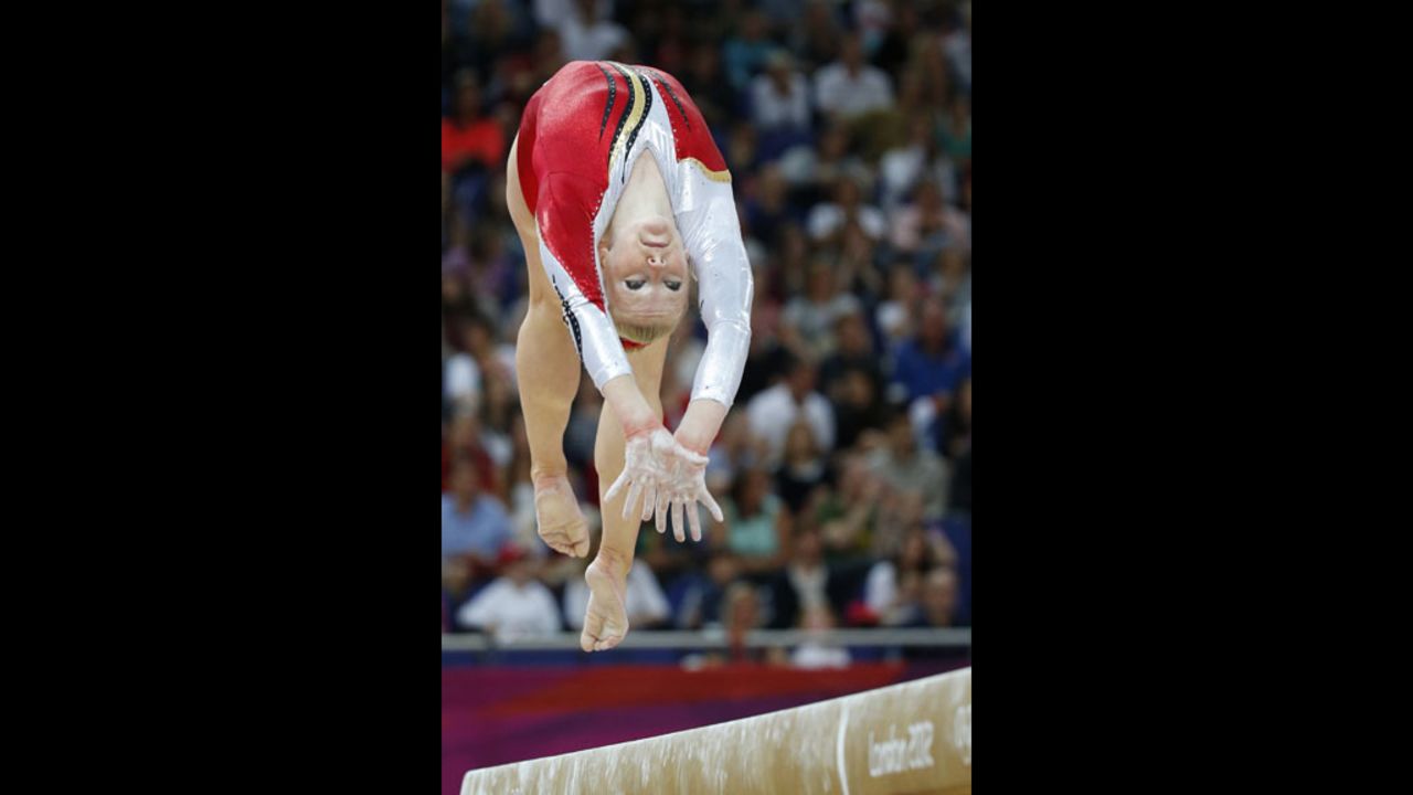 Gaelle Mys of Belgium performs on the beam during the women's qualification of the artistic gymnastics event.