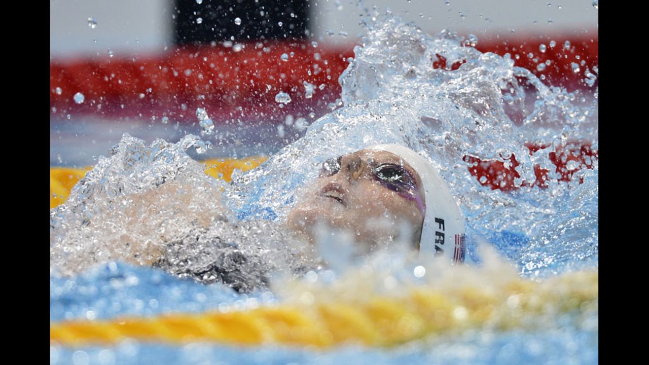 U.S. swimmer Missy Franklin competes in the women's 100 meter backstroke.