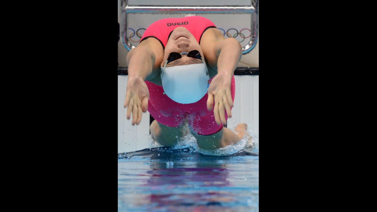 Anastasia Zueva of Russia competes in the women's 100 meter backstroke.
