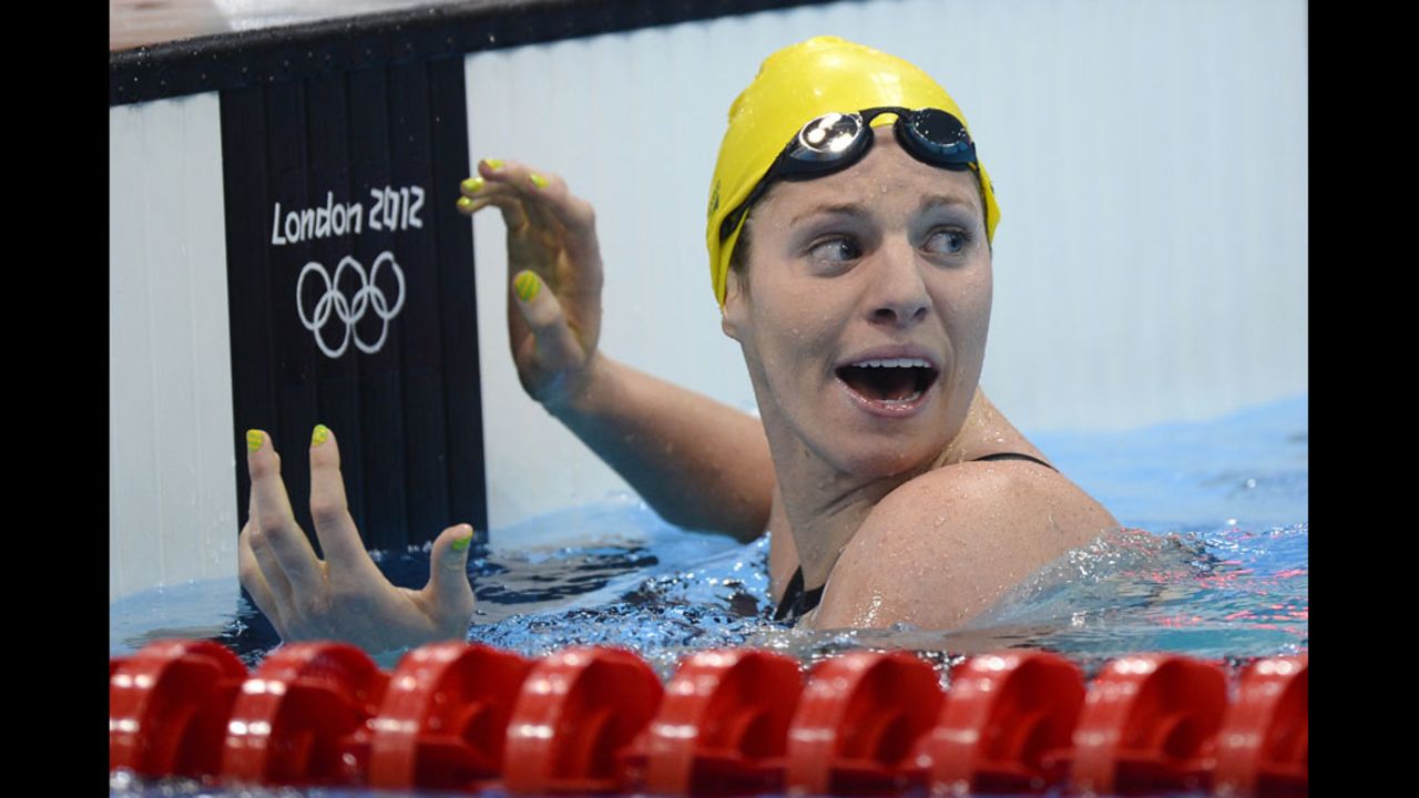 Australia's Emily Seebohm celebrates after breaking the Olympic record in the women's 100-meter backstroke heat. 