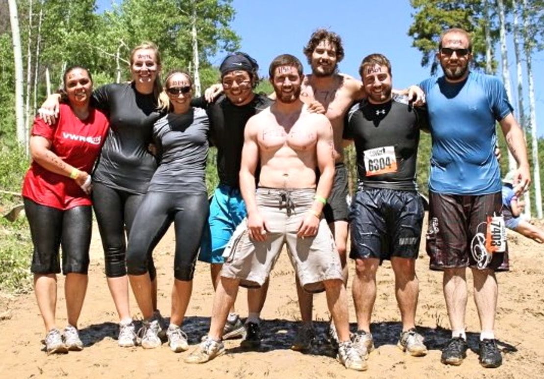 Alex Teves, center, at a Tough Mudder obstacle course designed by British Special Forces to test endurance and teamwork.