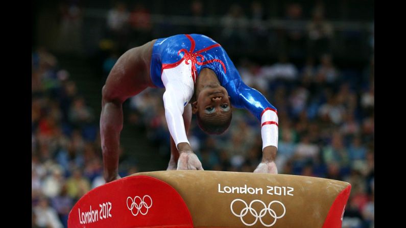 Yamilet Pena Abreu of the Dominican Republic competes in the vault competiton in the artistic gymnastics women's team qualification. See <a href="https://trans.hiragana.jp/ruby/http://www.cnn.com/2012/07/30/worldsport/gallery/olympics-day-three/index.html" target="_blank">day three of the competition</a> from Monday, July 30.