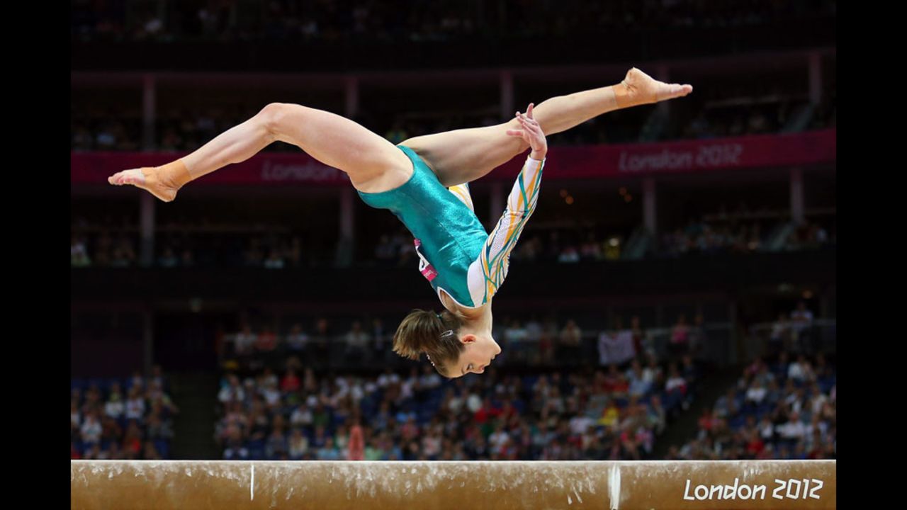 Australia's Lauren Mitchell competes on the balance beam in the artistic gymnastics women's team qualification.
