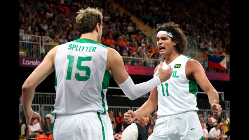 Brazil's Tiago Splitter, left, and teammate Anderson Varejao react after a foul against Australia during the Brazil-Australia men's basketball game.