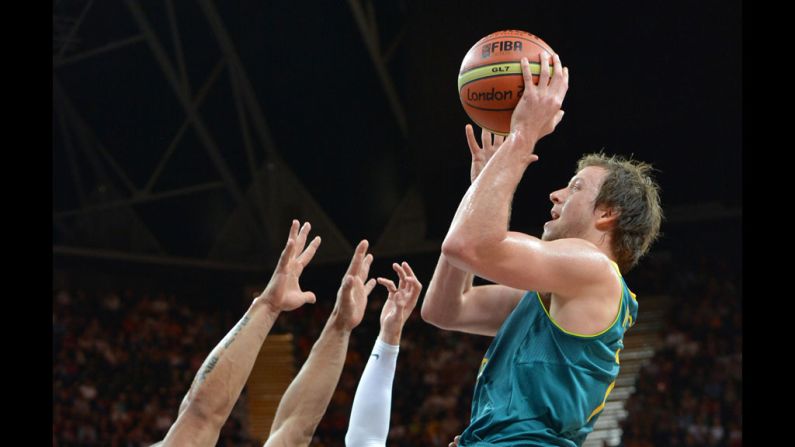 Australian forward Joe Ingles shoots during a men's preliminary round basketball match against Brazil.