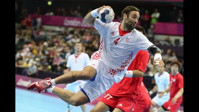 Center back Ivano Balic of Croatia jumps to shoot during a men's preliminary handball against South Korea.