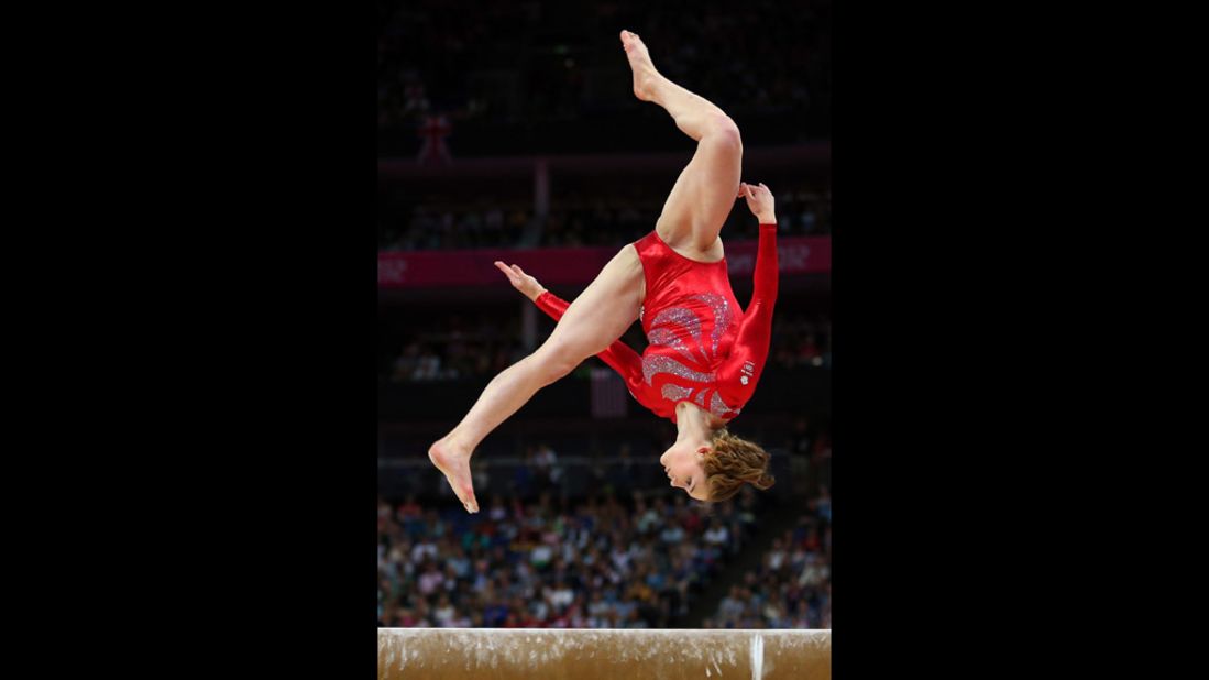 Great Britain's Jennifer Pinches shows her prowess on the beam in the artistic gymnastics women's team qualification round.