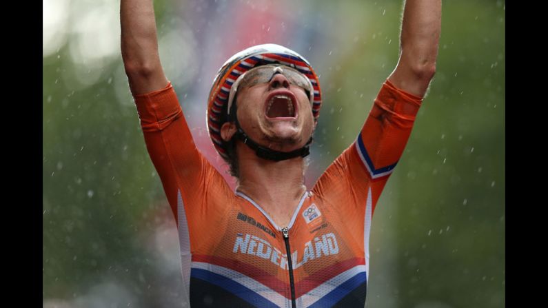 Marianne Vos of the Netherlands celebrates as she crosses the finish line to win the women's road race.