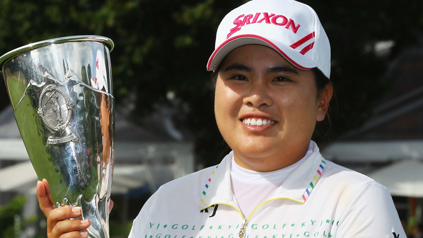 Park Inbee clutches the winning trophy at the Evian Masters after the South Korean's two-shot victory.