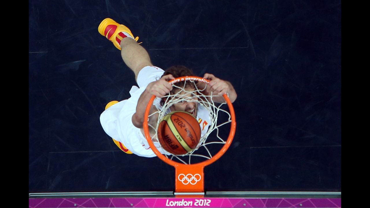 Spain's Pau Gasol dunks the ball against China at the Basketball Arena in London.