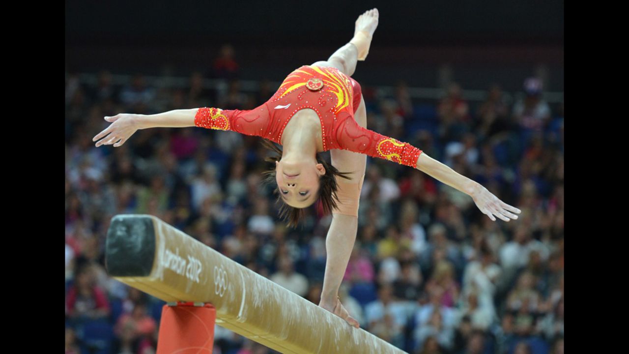 Chinese gymnast Yao Jinnan performs on the beam during the women's artistic gymnastics qualification round.