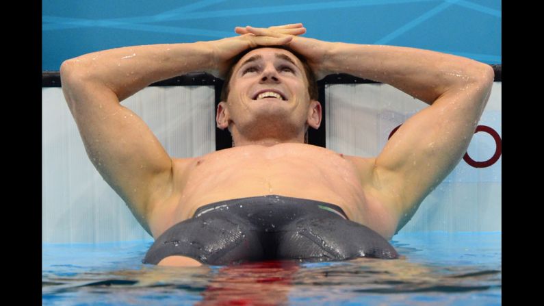 South Africa's Cameron Van der Burgh celebrates after breaking the world record in the men's 100-meter breaststroke at the London Olympics on Sunday, July 29. Check out <a href="https://trans.hiragana.jp/ruby/http://www.cnn.com/2012/07/28/worldsport/gallery/olympics-day-one/index.html"><strong>Day 1 of competition</strong></a> from Saturday, July 28. The 2012 Summer Olympics ran through August 12. 