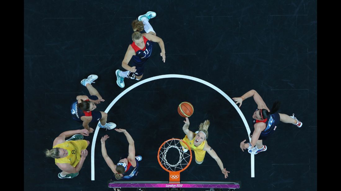 Australia's Samantha Richards, center, shoots a layup against Great Britain during women's basketball play.