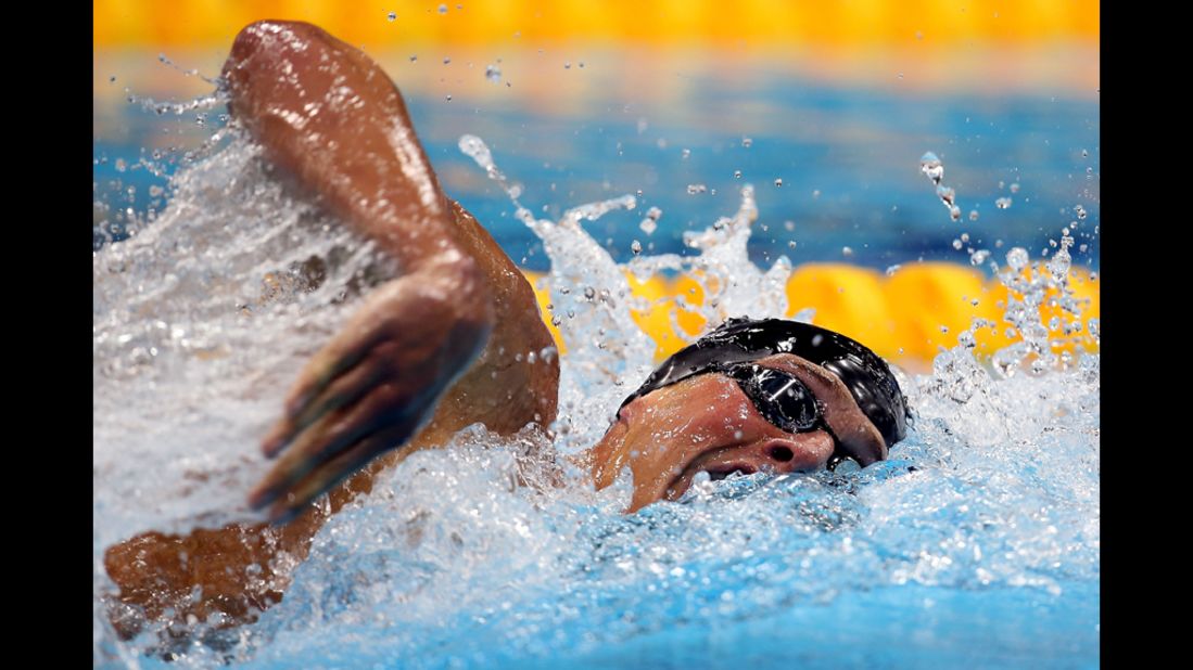 Ryan Lochte of the United States cuts through the water in the freestyle portion of the men's 400-meter individual medley finals on Saturday. Lochte won the gold medal.