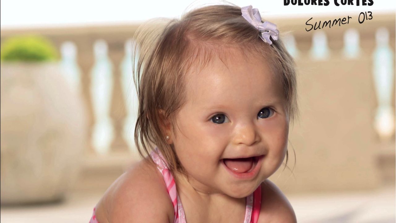 Designer Dolores Cortés featured Valentina Guerrero, an infant with Down syndrome, in her 2013 collection.