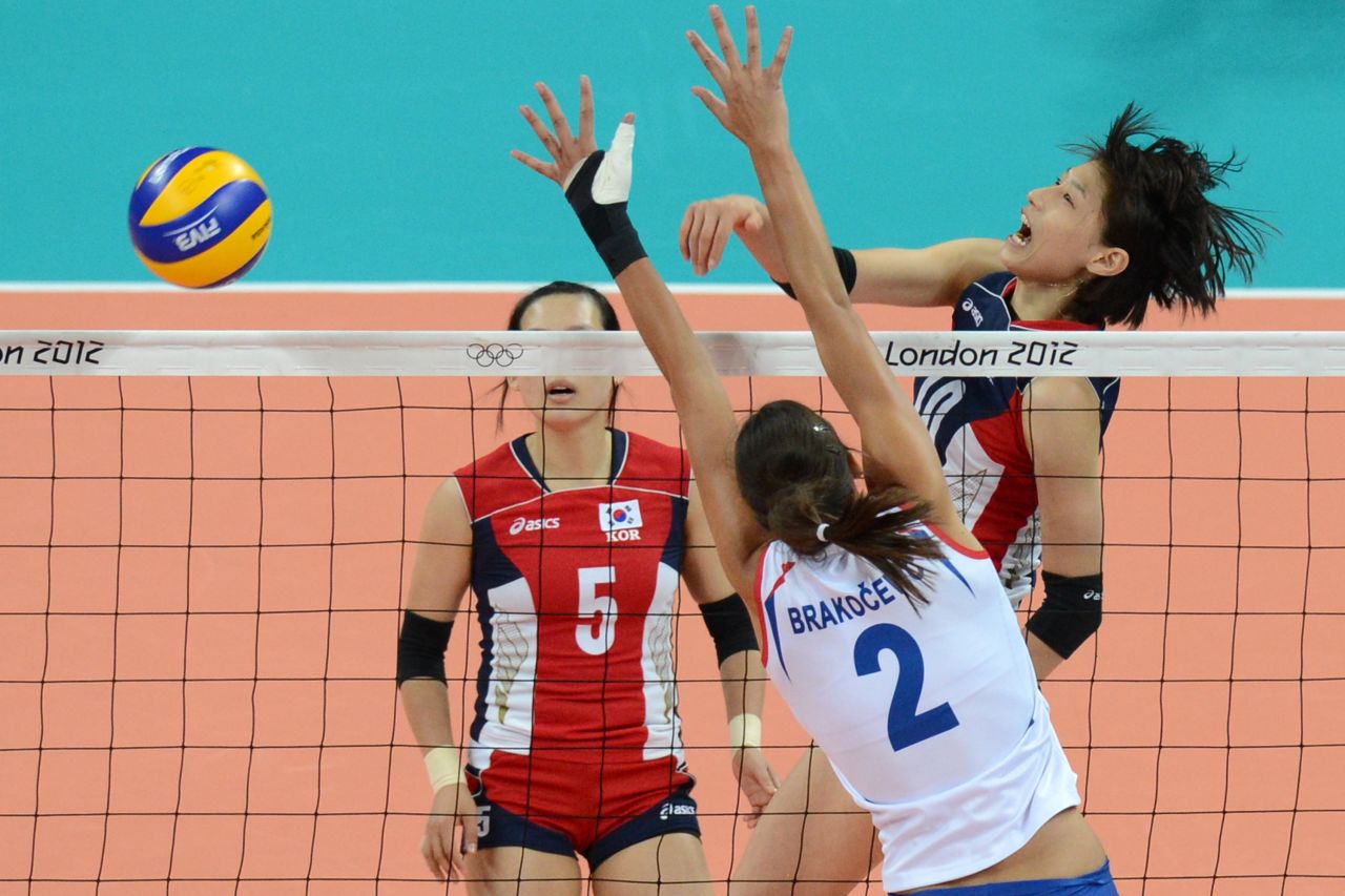 South Korea's Kim Yeon-Koung spikes the ball as Serbia's Jovana Brakocevic attempts a block during the women's volleyball match Monday.