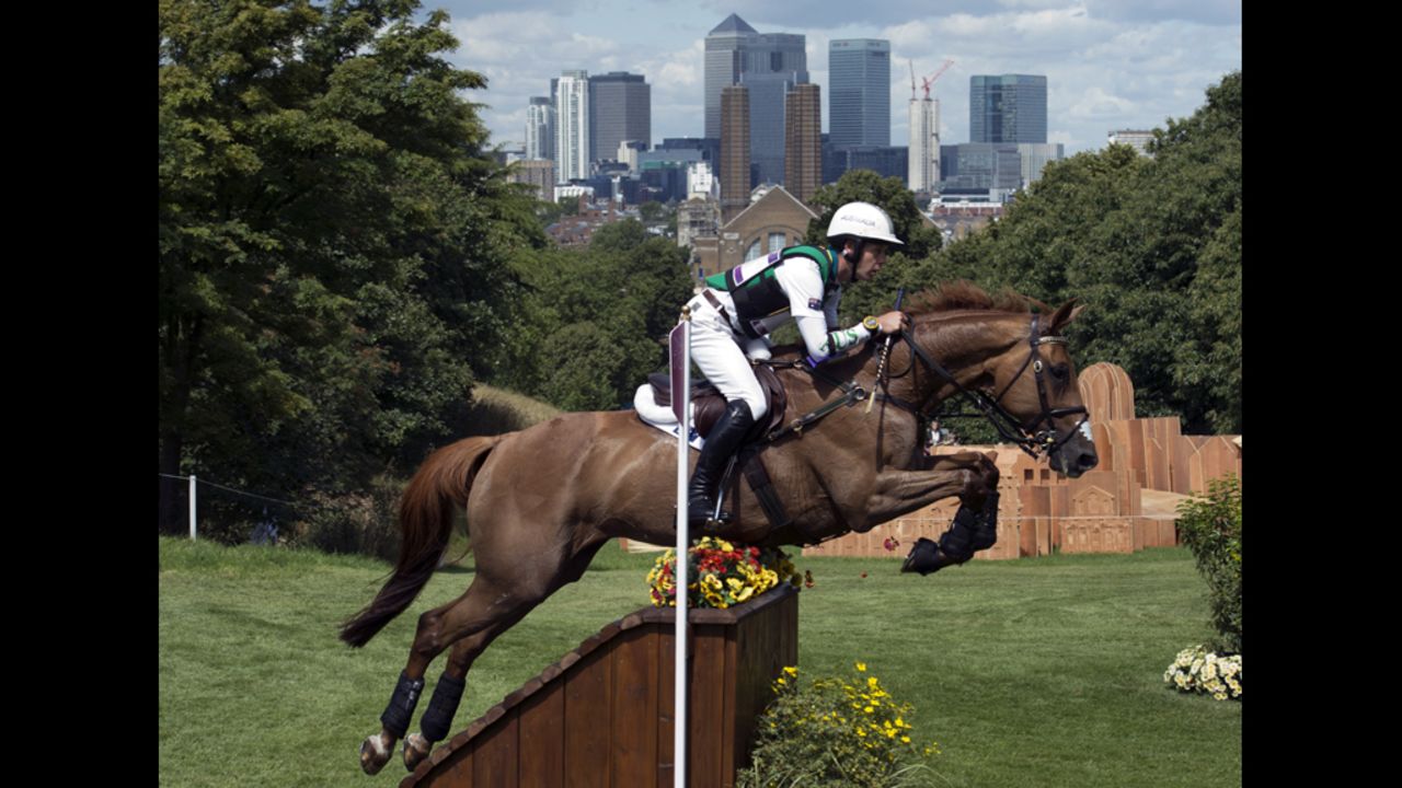 Australia's Chris Burton, riding HP Leilani, competes in the cross-country phase of the equestrian eventing competition in Greenwich Park, London, on Monday.