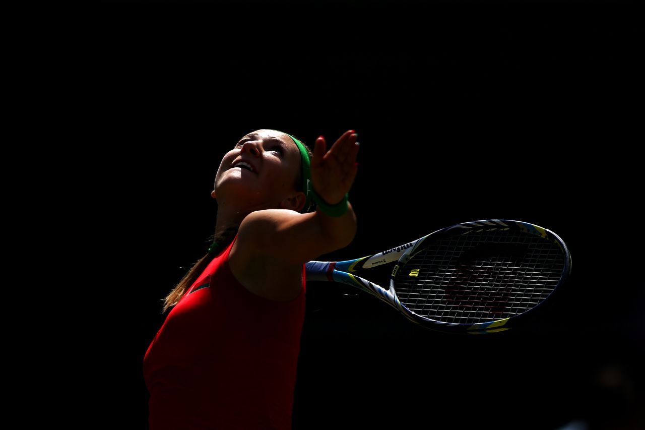 Victoria Azarenka of Belarus serves during the women's singles tennis match against Irina-Camelia Begu of Romania on Monday.