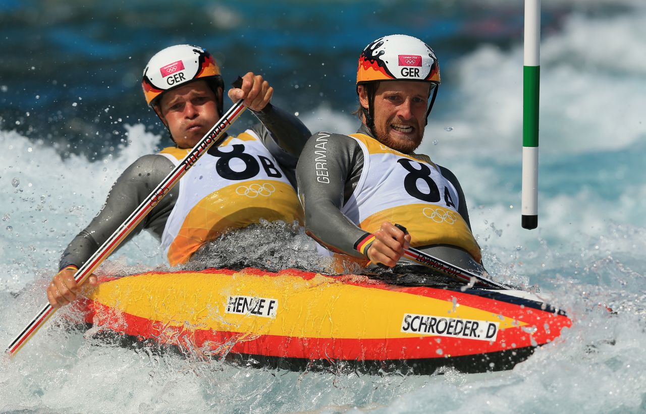 David Schroeder and Frank Henze of Germany compete in the men's canoe double heats Monday.