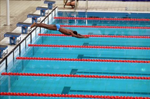 His two opponents in the heat were disqualified for false starts. Moussambani, who had learned his technique from the American swim team in the two days before the race, set off on his own as the crowd cheered.