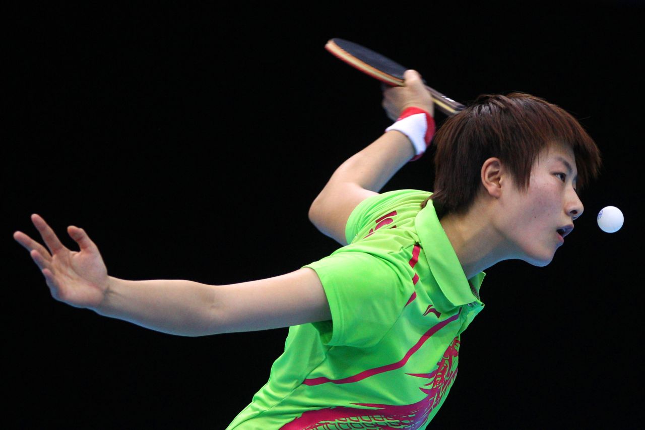 Ning Ding of China eyes the ball during her women's singles table tennis fourth-round match against Huajun Jiang of Hong Kong on Monday.