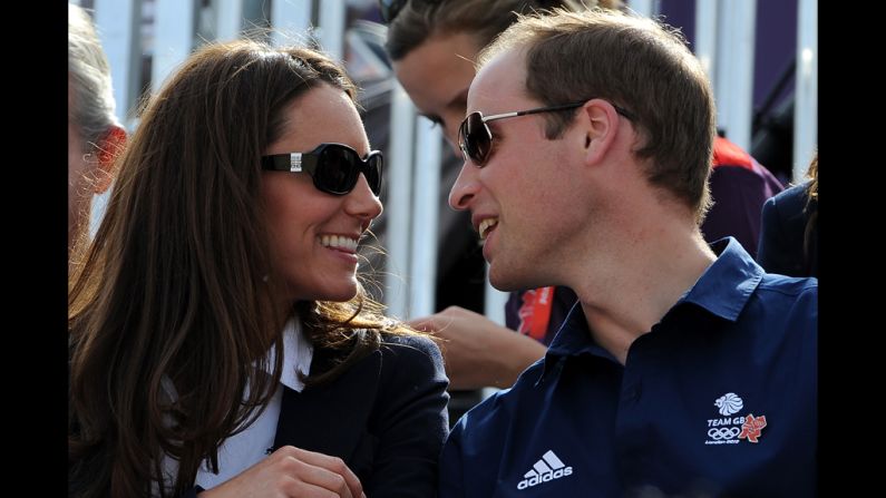 Catherine, duchess of Cambridge, and Prince William, duke of Cambridge, watch the cross-country equestrian competition Monday. William's cousin Zara Philips, daughter of Princess Anne, rode for Great Britain in the event.