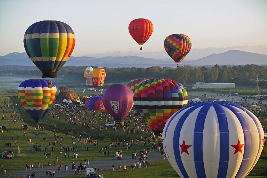 Celebrating 40 years of festivity, the lineup at this year's Adirondack Balloon Festival in Glen Falls, New York, includes a balloon shaped like a birthday cake. 