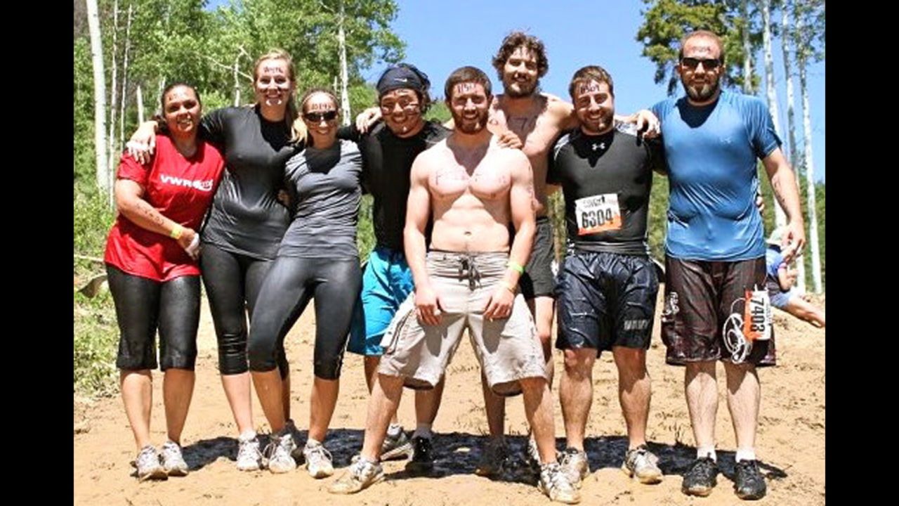 Teves, center, took part in a Tough Mudder obstacle course designed by British special forces to test endurance and teamwork.