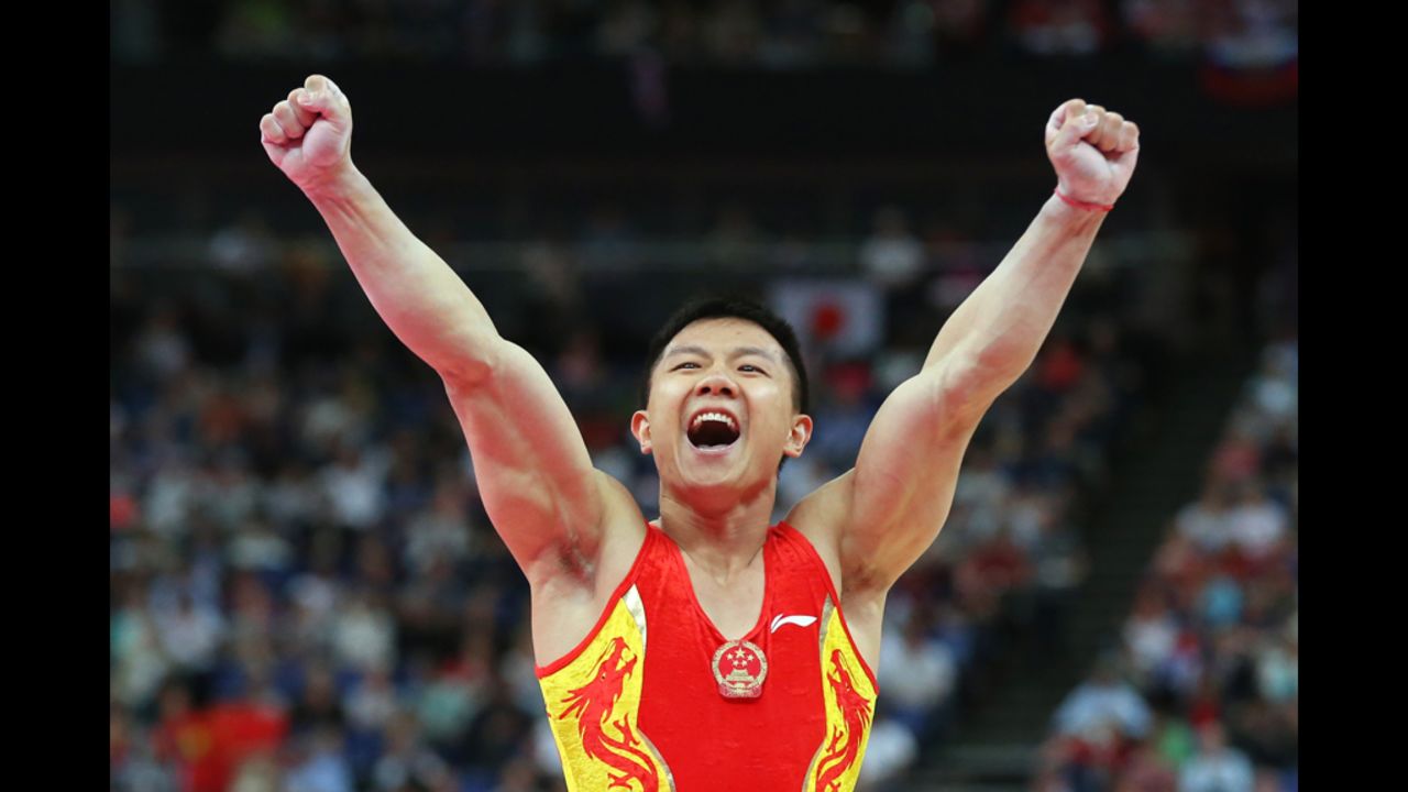 Yibing Chen of China reacts after completing the pommel horse in the artistic gymnastics men's team final.
