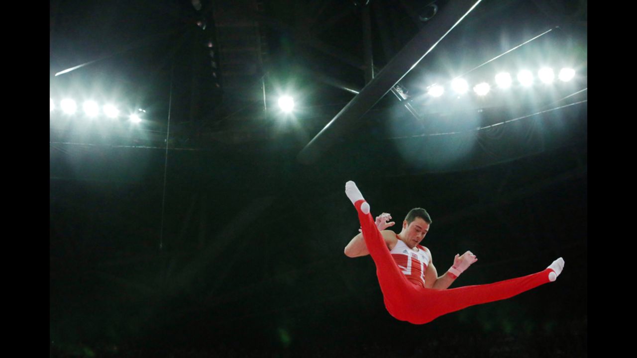 Kristian Thomas of Great Britain competes on the horizontal bar in the artistic gymnastics men's team final on Monday.