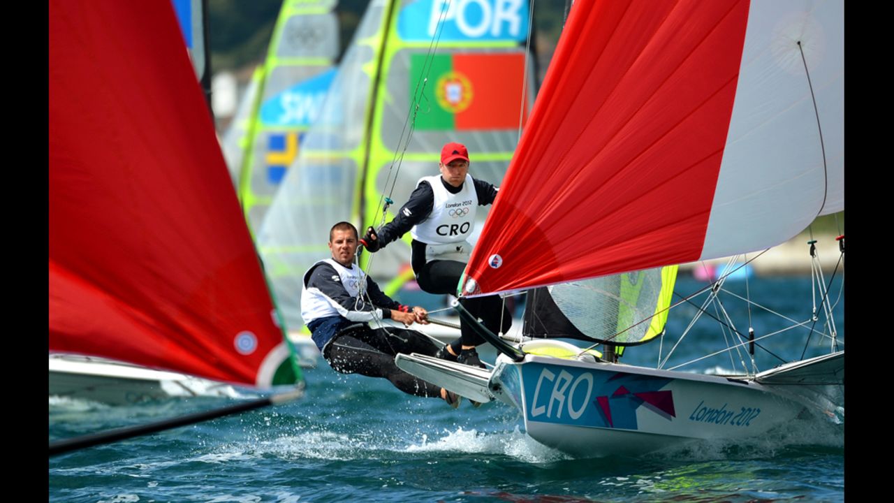 Croatia's Petar Cupac and Pavle Kostov sail through the fleet in the 49er sailing class on Monday in Weymouth.