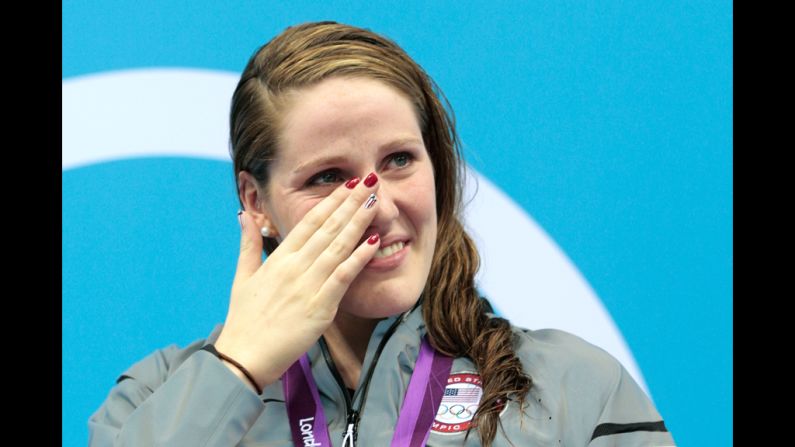 Missy Franklin of the United States wipes a tear from her face as she reacts during the medal ceremony for the women's 100-meter backstroke on Monday.