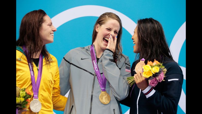 From left, silver medalist Emily Seebohm of Australia, gold medalist Missy Franklin of the United States and bronze medalist Aya Terakawa of Japan celebrate with their medals during the medal ceremony for the women's 100-meter backstroke on Monday.