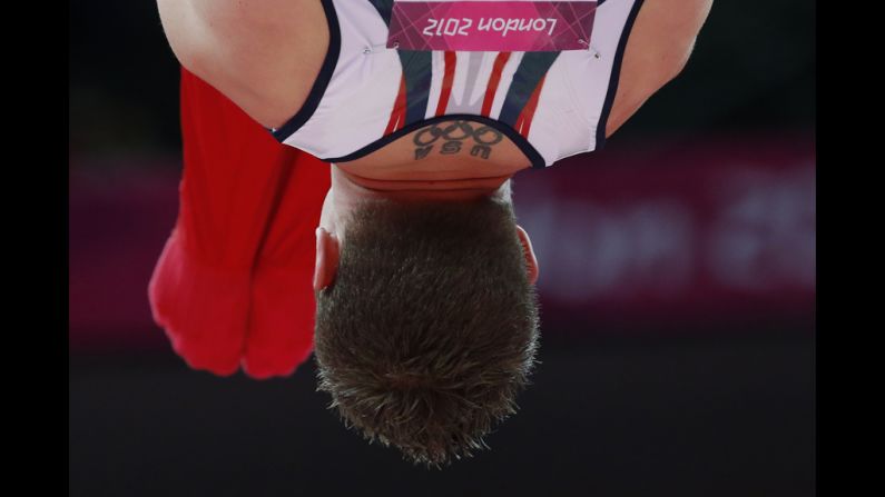 U.S. gymnast Jonathan Horton competes on the rings during the men's team final of the artistic gymnastics event.