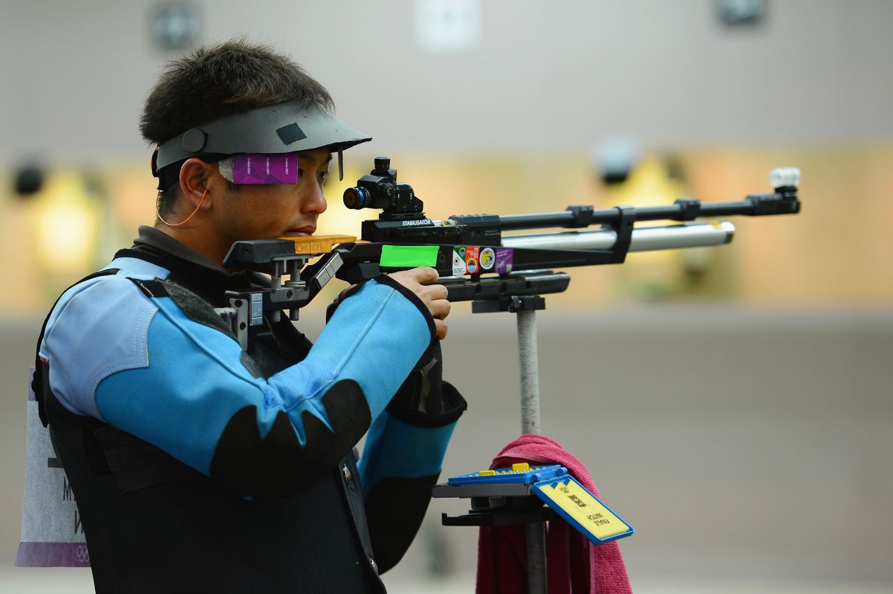 Midori Yajima of Japan competes in the men's 10-meter air rifle qualification on Day 3 of the London 2012 Olympic Games on Monday.