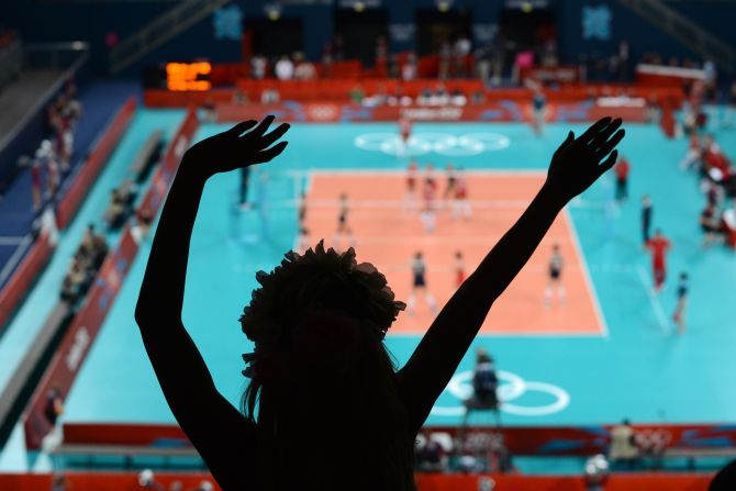 The women's volleyball match between China and Turkey draws cheers on Monday.