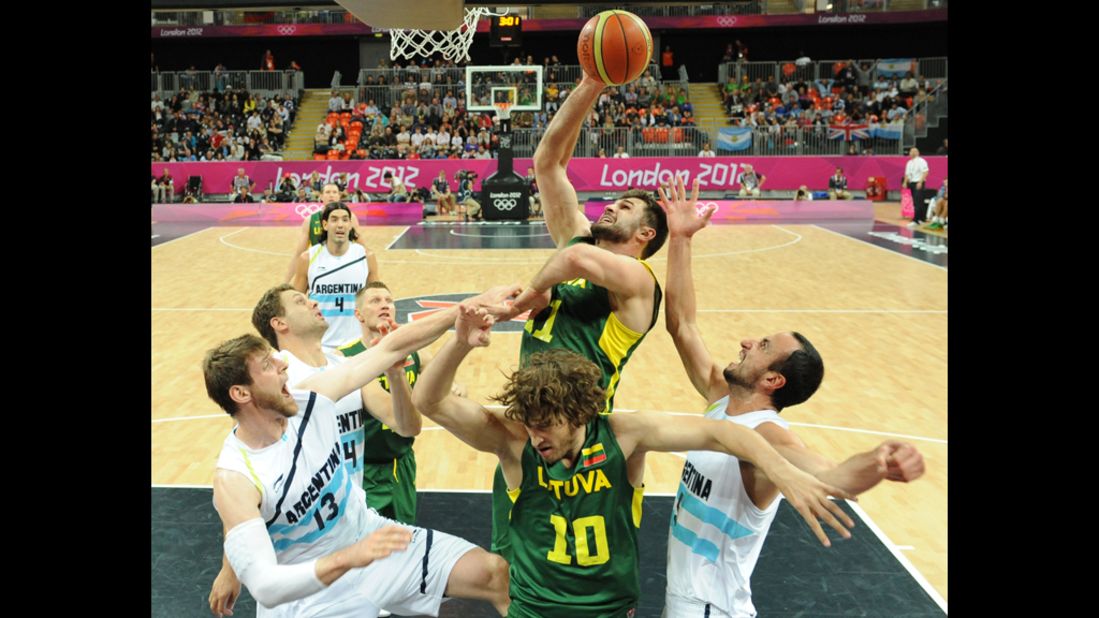 Lithuanian forward Linas Kleiza shoots during a preliminary basketball match against Argentina.