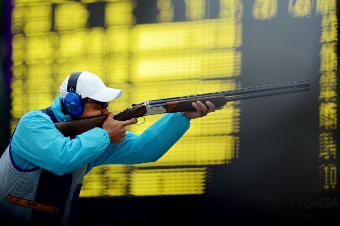 Azmy Mehelba of Egypt competes in the men's skeet qualification round Tuesday at the Royal Artillery Barracks.