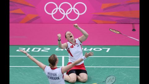 Kamilla Rytter Juhl, right, and Christinna Pedersen of Denmark celebrate after beating China's Yunlei Zhao and Qing Tian in a women's doubles badminton match Tuesday.