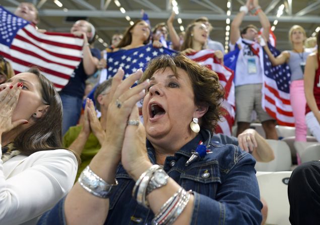 U.S. swimmer Michael Phelps' mother, Debbie, cheers as her son competes in the men's 200-meter backstroke final.