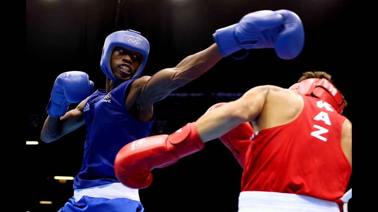 Salomo Ntuve of Sweden (left) in action with Ilyas Suleimenov of Kazakhstan during their men's fly boxing match.