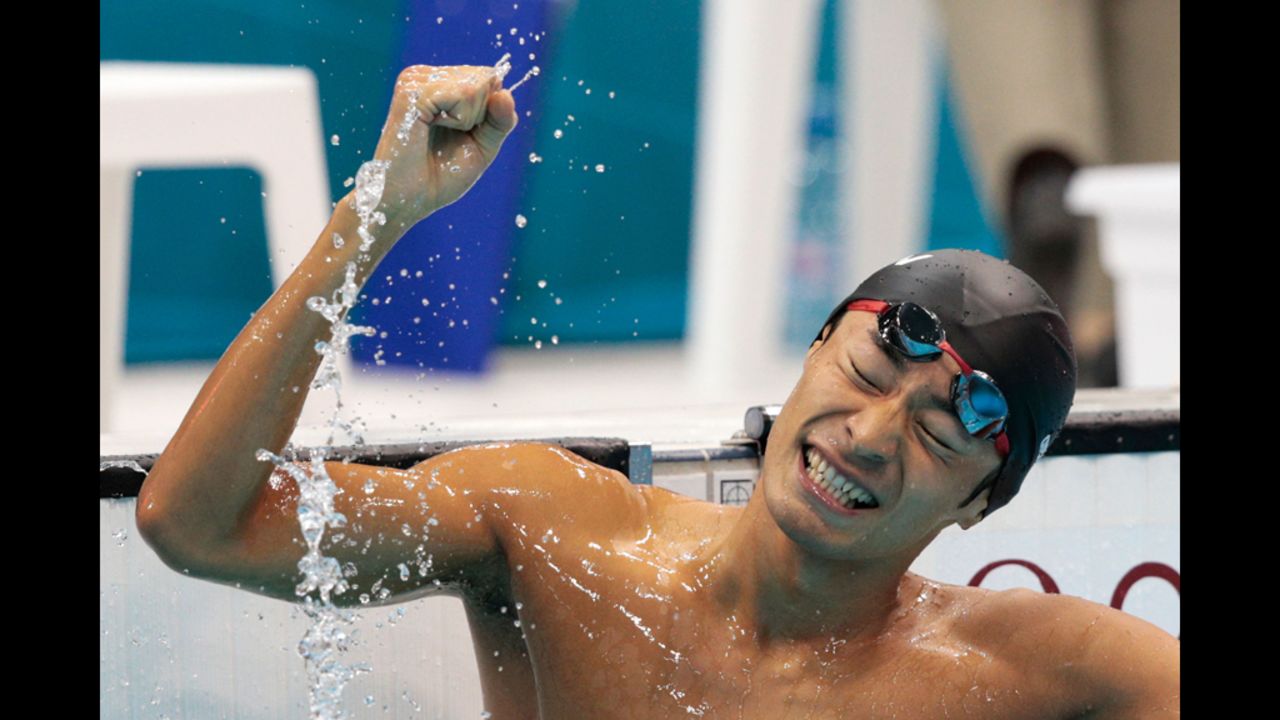 Ryosuke Irie of Japan celebrates after winning the bronze medal in the final of the men's 100-meter backstroke.