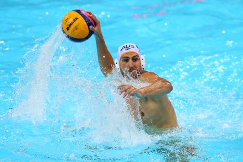 Australia's Rhys Howden looks to take a shot during a men's water polo preliminary round match against Kazakhstan on Tuesday.