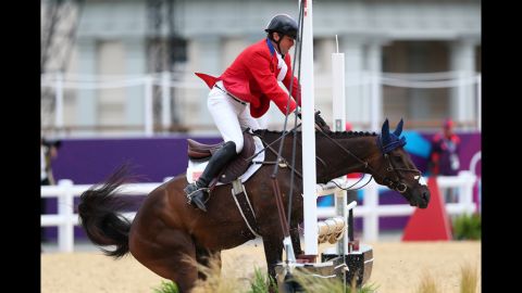 American Phillip Dutton riding Mystery Whisper balks at a jump in the show jumping equestrian event Tuesday.