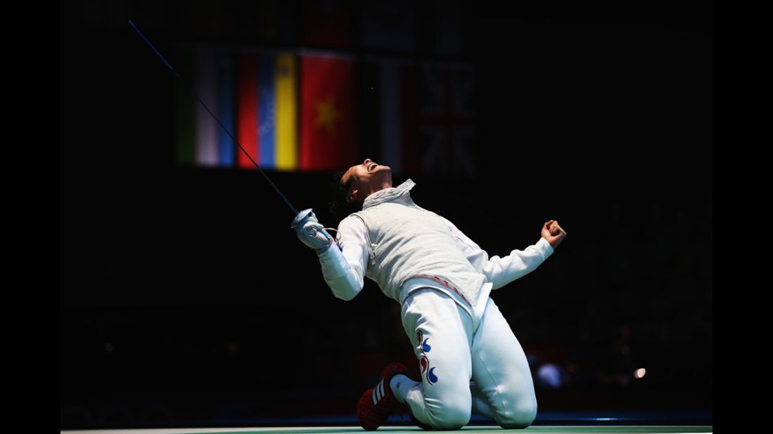 Byungchul Choi of South Korea celebrates winning during the quarterfinals of the men's foil individual.