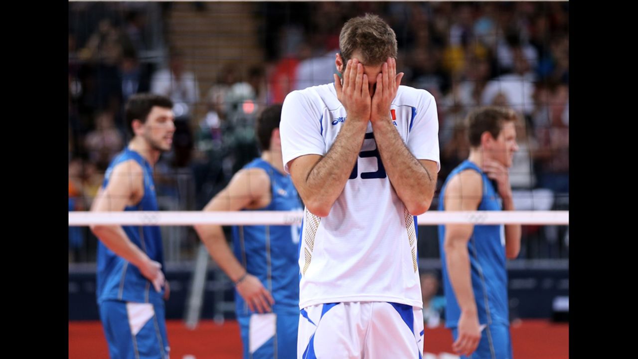 Italy's Dragan Travica reacts after the Italians won their men's volleyball match against Argentina.