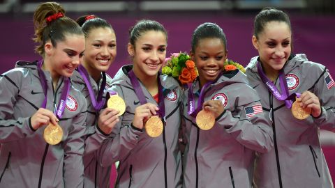 (From L) Gold medalist Team US Mckayla Maroney, Kyla Ross, Alexandra Raisman, Gabrielle Douglas and Jordyn Wieber celebrate in London Olympic Games 2012. 