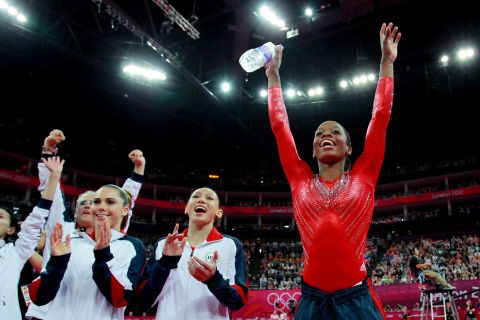 McKayla Maroney (from left), Kyla Ross and Gabrielle Douglas of the United States celebrate during the gymnastics women's team final.