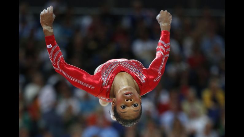 U.S. gymnast Gabrielle Douglas performs on the beam during the women's team final of the gymnastics event.